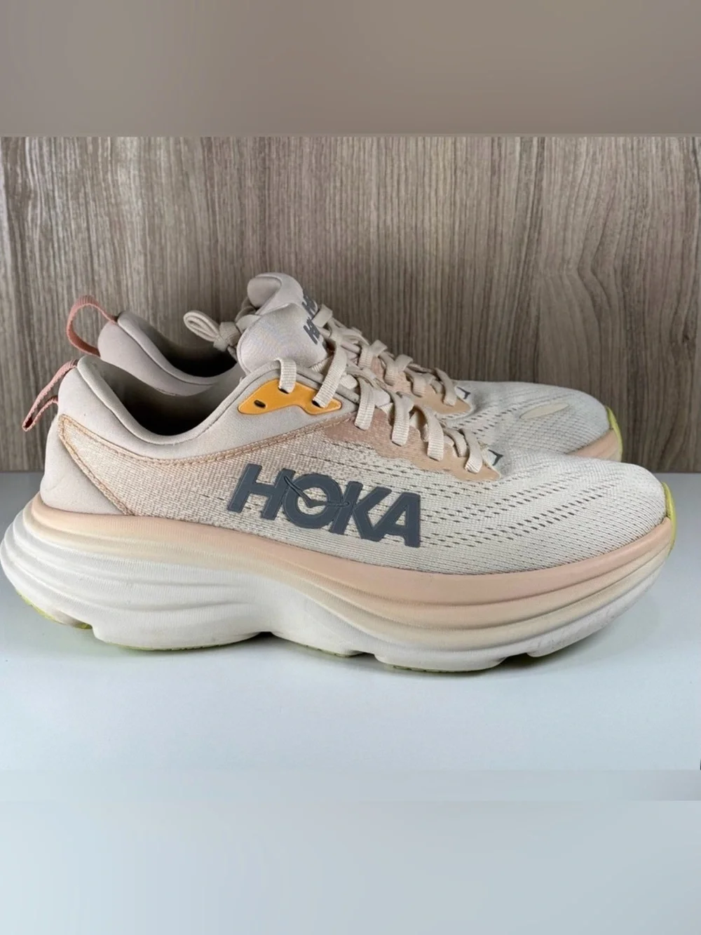 Hoka Women's Running Shoes in Cream and Peach with Gray Logo